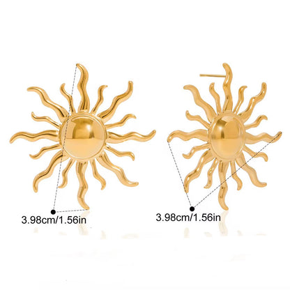 Gold sun-shaped earrings with measurements and material details on a white background