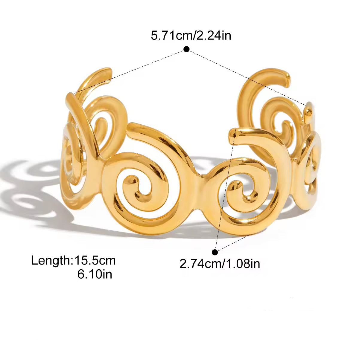 Gold bracelet with spiral design on a white background