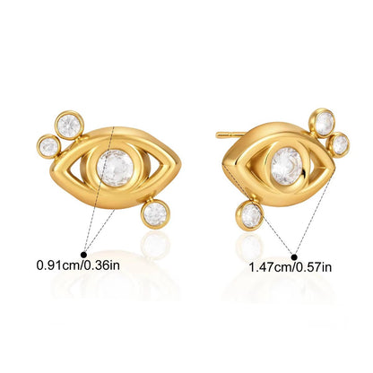 Gold eye-shaped stud earrings with clear crystal gemstones, shown from front and side views with dimensions, weight, and material details on a white background.