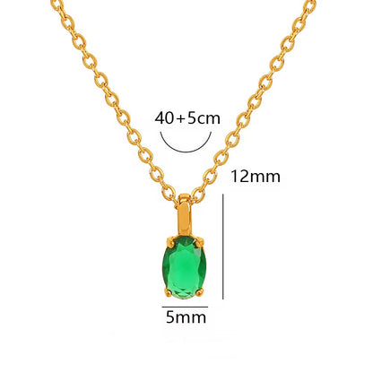 Gold necklace with a green gemstone, showing measurements and material details.